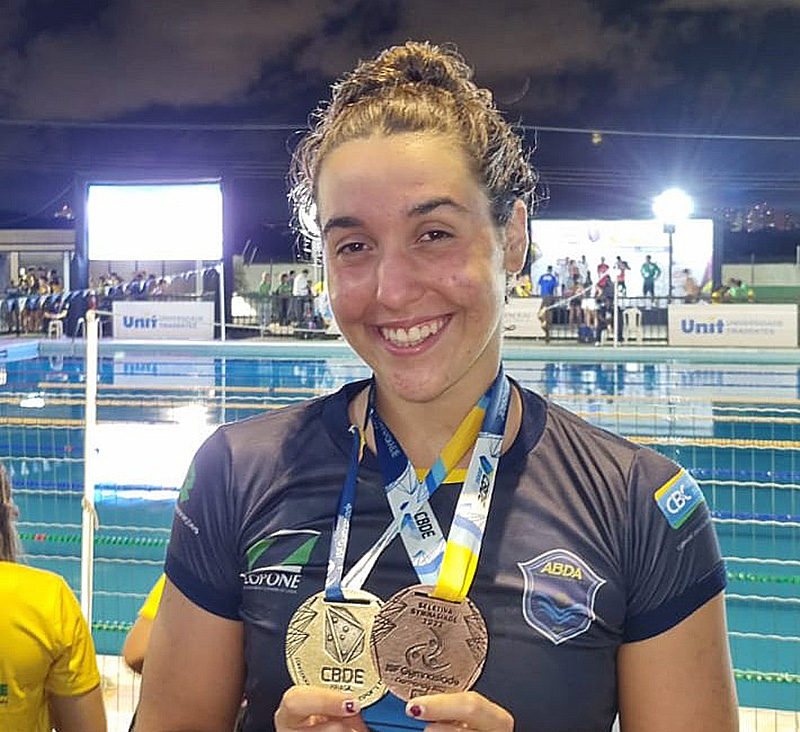 A atleta venceu a prova dos 200m livre, ficou em 3 lugar nos 50m livre e em 4 nos 100m livre. 